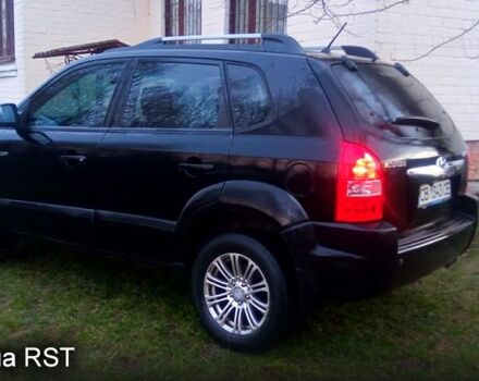 Чорний Хендай Туксон, об'ємом двигуна 2 л та пробігом 179 тис. км за 8300 $, фото 4 на Automoto.ua