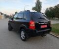Черный Хендай Туксон, объемом двигателя 2 л и пробегом 192 тыс. км за 7950 $, фото 5 на Automoto.ua