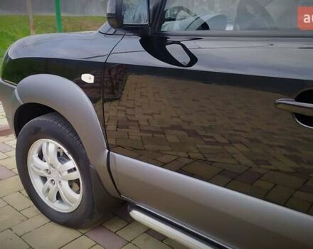 Чорний Хендай Туксон, об'ємом двигуна 2 л та пробігом 229 тис. км за 8600 $, фото 91 на Automoto.ua