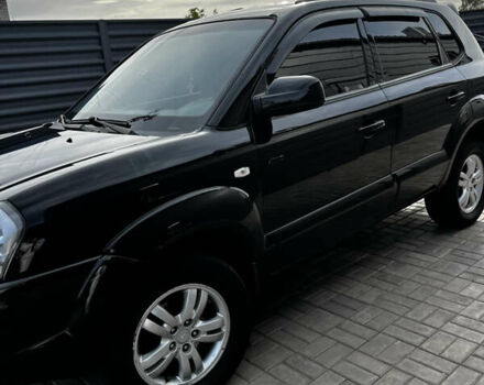 Чорний Хендай Туксон, об'ємом двигуна 2 л та пробігом 253 тис. км за 9428 $, фото 2 на Automoto.ua