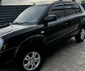 Чорний Хендай Туксон, об'ємом двигуна 2 л та пробігом 253 тис. км за 9428 $, фото 2 на Automoto.ua