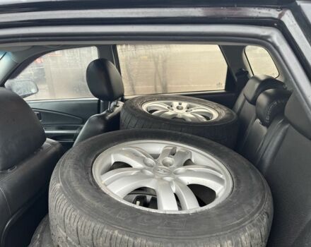 Черный Хендай Туксон, объемом двигателя 2 л и пробегом 177 тыс. км за 8500 $, фото 8 на Automoto.ua