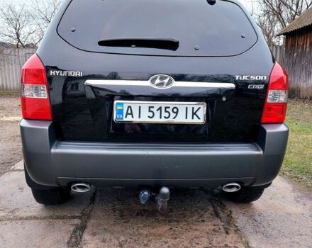 Черный Хендай Туксон, объемом двигателя 2 л и пробегом 272 тыс. км за 7500 $, фото 5 на Automoto.ua
