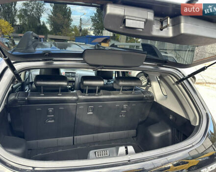 Чорний Хендай Туксон, об'ємом двигуна 2 л та пробігом 180 тис. км за 7999 $, фото 12 на Automoto.ua