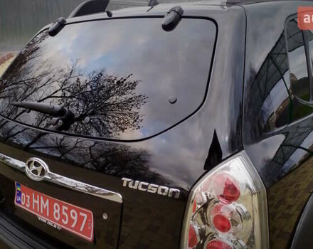 Чорний Хендай Туксон, об'ємом двигуна 2 л та пробігом 229 тис. км за 8600 $, фото 75 на Automoto.ua