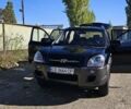 Черный Хендай Туксон, объемом двигателя 2 л и пробегом 218 тыс. км за 8600 $, фото 1 на Automoto.ua