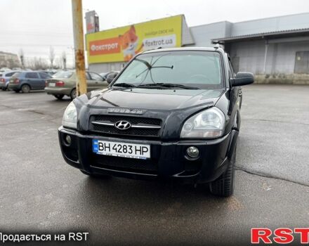 Черный Хендай Туксон, объемом двигателя 2 л и пробегом 190 тыс. км за 7800 $, фото 7 на Automoto.ua