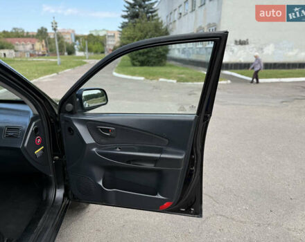 Черный Хендай Туксон, объемом двигателя 2 л и пробегом 300 тыс. км за 7350 $, фото 66 на Automoto.ua