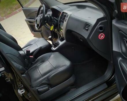 Чорний Хендай Туксон, об'ємом двигуна 2 л та пробігом 229 тис. км за 8600 $, фото 110 на Automoto.ua