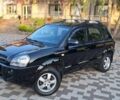 Чорний Хендай Туксон, об'ємом двигуна 2 л та пробігом 190 тис. км за 8350 $, фото 20 на Automoto.ua