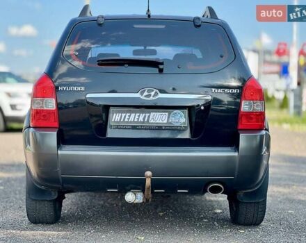 Черный Хендай Туксон, объемом двигателя 2 л и пробегом 227 тыс. км за 8200 $, фото 12 на Automoto.ua