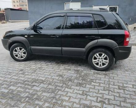 Черный Хендай Туксон, объемом двигателя 2.7 л и пробегом 280 тыс. км за 7200 $, фото 15 на Automoto.ua