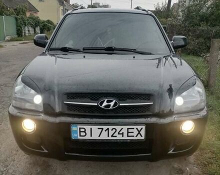 Черный Хендай Туксон, объемом двигателя 1.98 л и пробегом 238 тыс. км за 8400 $, фото 7 на Automoto.ua