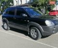 Черный Хендай Туксон, объемом двигателя 2 л и пробегом 270 тыс. км за 10250 $, фото 10 на Automoto.ua