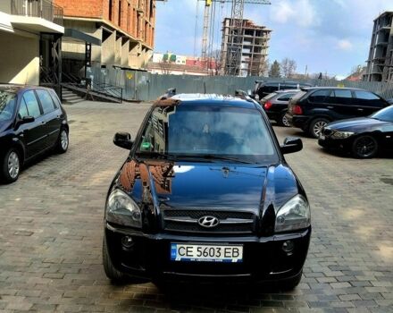 Чорний Хендай Туксон, об'ємом двигуна 2 л та пробігом 190 тис. км за 7500 $, фото 3 на Automoto.ua