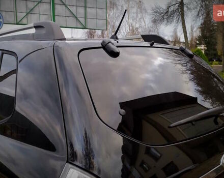 Чорний Хендай Туксон, об'ємом двигуна 2 л та пробігом 229 тис. км за 8600 $, фото 79 на Automoto.ua