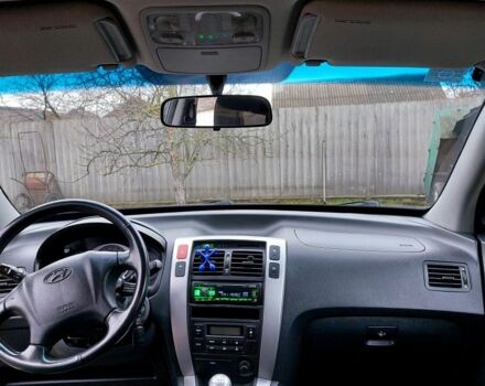 Черный Хендай Туксон, объемом двигателя 2 л и пробегом 272 тыс. км за 7500 $, фото 12 на Automoto.ua