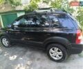 Черный Хендай Туксон, объемом двигателя 2 л и пробегом 170 тыс. км за 8500 $, фото 28 на Automoto.ua