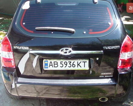 Черный Хендай Туксон, объемом двигателя 1.98 л и пробегом 234 тыс. км за 7800 $, фото 1 на Automoto.ua