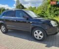 Чорний Хендай Туксон, об'ємом двигуна 2 л та пробігом 218 тис. км за 8500 $, фото 1 на Automoto.ua