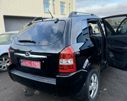 Черный Хендай Туксон, объемом двигателя 1.98 л и пробегом 230 тыс. км за 7750 $, фото 17 на Automoto.ua