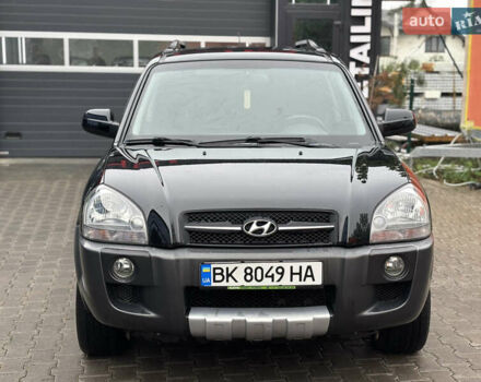 Черный Хендай Туксон, объемом двигателя 2 л и пробегом 327 тыс. км за 7850 $, фото 10 на Automoto.ua