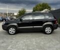 Черный Хендай Туксон, объемом двигателя 2 л и пробегом 232 тыс. км за 8900 $, фото 7 на Automoto.ua