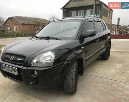 Черный Хендай Туксон, объемом двигателя 2 л и пробегом 210 тыс. км за 8999 $, фото 32 на Automoto.ua