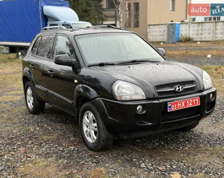 Чорний Хендай Туксон, об'ємом двигуна 2 л та пробігом 196 тис. км за 7250 $, фото 11 на Automoto.ua