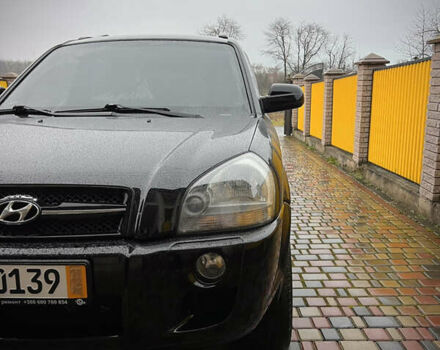 Черный Хендай Туксон, объемом двигателя 2 л и пробегом 151 тыс. км за 9100 $, фото 3 на Automoto.ua