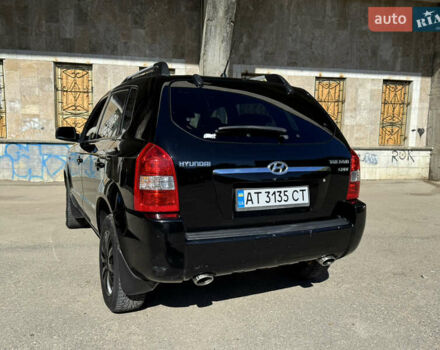 Черный Хендай Туксон, объемом двигателя 2 л и пробегом 189 тыс. км за 8250 $, фото 19 на Automoto.ua