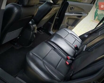 Чорний Хендай Туксон, об'ємом двигуна 2 л та пробігом 229 тис. км за 8600 $, фото 133 на Automoto.ua