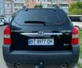 Черный Хендай Туксон, объемом двигателя 2.7 л и пробегом 180 тыс. км за 7900 $, фото 3 на Automoto.ua
