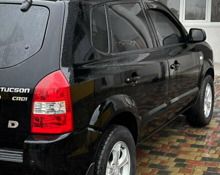 Черный Хендай Туксон, объемом двигателя 2 л и пробегом 151 тыс. км за 9100 $, фото 27 на Automoto.ua