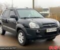 Чорний Хендай Туксон, об'ємом двигуна 2 л та пробігом 154 тис. км за 7400 $, фото 5 на Automoto.ua