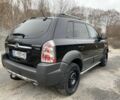 Черный Хендай Туксон, объемом двигателя 2 л и пробегом 330 тыс. км за 4350 $, фото 7 на Automoto.ua