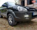 Чорний Хендай Туксон, об'ємом двигуна 2.66 л та пробігом 200 тис. км за 8900 $, фото 3 на Automoto.ua