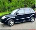 Черный Хендай Туксон, объемом двигателя 2 л и пробегом 175 тыс. км за 8900 $, фото 1 на Automoto.ua