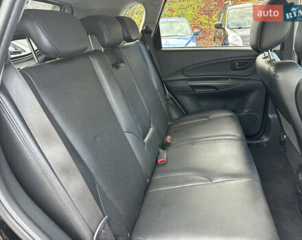 Чорний Хендай Туксон, об'ємом двигуна 2 л та пробігом 180 тис. км за 7999 $, фото 10 на Automoto.ua
