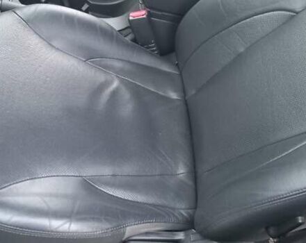 Черный Хендай Туксон, объемом двигателя 1.98 л и пробегом 155 тыс. км за 7999 $, фото 28 на Automoto.ua