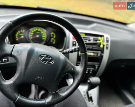 Черный Хендай Туксон, объемом двигателя 1.99 л и пробегом 266 тыс. км за 7500 $, фото 33 на Automoto.ua