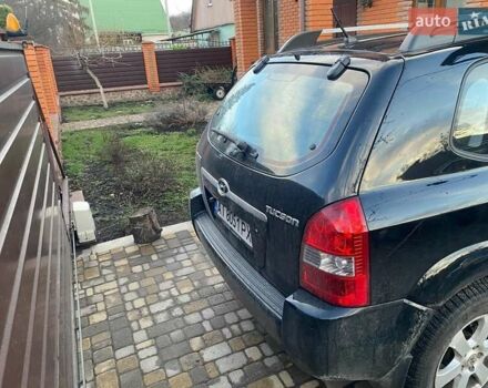 Черный Хендай Туксон, объемом двигателя 2 л и пробегом 84 тыс. км за 8650 $, фото 3 на Automoto.ua