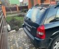Черный Хендай Туксон, объемом двигателя 2 л и пробегом 84 тыс. км за 8650 $, фото 3 на Automoto.ua