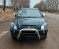 Чорний Хендай Туксон, об'ємом двигуна 1.98 л та пробігом 209 тис. км за 9000 $, фото 1 на Automoto.ua