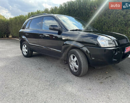 Черный Хендай Туксон, объемом двигателя 2 л и пробегом 256 тыс. км за 7800 $, фото 18 на Automoto.ua