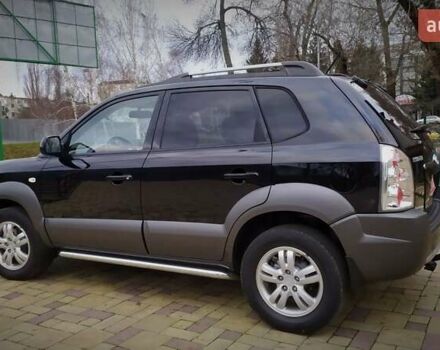 Чорний Хендай Туксон, об'ємом двигуна 2 л та пробігом 229 тис. км за 8600 $, фото 50 на Automoto.ua