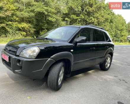 Черный Хендай Туксон, объемом двигателя 2 л и пробегом 174 тыс. км за 7600 $, фото 6 на Automoto.ua