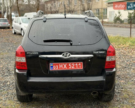 Чорний Хендай Туксон, об'ємом двигуна 2 л та пробігом 196 тис. км за 7250 $, фото 12 на Automoto.ua