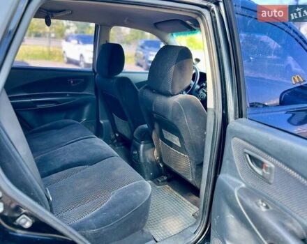 Черный Хендай Туксон, объемом двигателя 2 л и пробегом 227 тыс. км за 8200 $, фото 17 на Automoto.ua