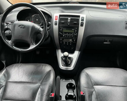 Черный Хендай Туксон, объемом двигателя 2 л и пробегом 180 тыс. км за 7700 $, фото 29 на Automoto.ua